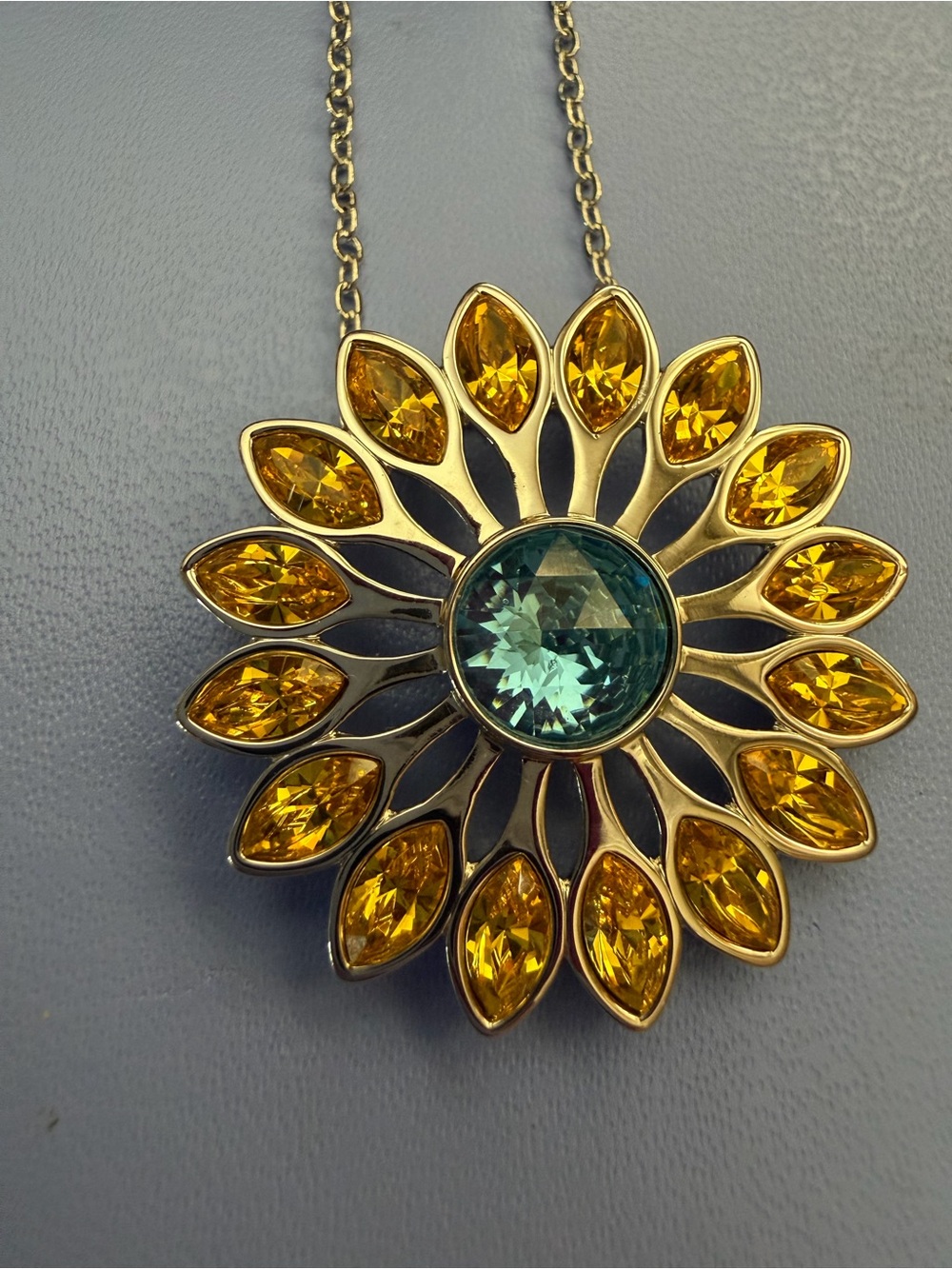 Touchstone Crystal Gold-Tone Sunflower Necklace with Teal and Yellow Stones